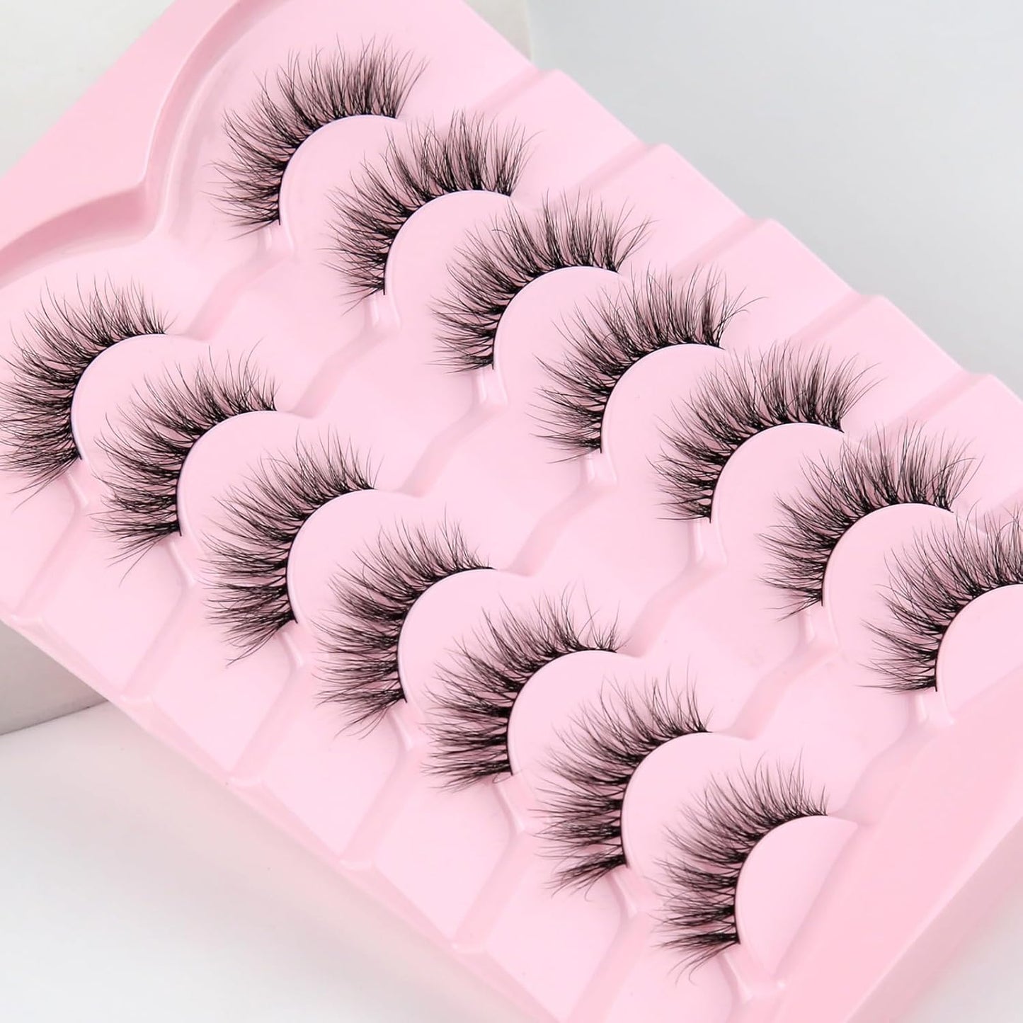 Natural Cat Eye Lashes Wispy Eyelashes 14mm Lightweight False Eyelashes 3D Volume Natural Strip Lashes 0.1mm Thin Cotton Band Lashes Pack C Curl Soft Lashes 7 Pairs Siligli